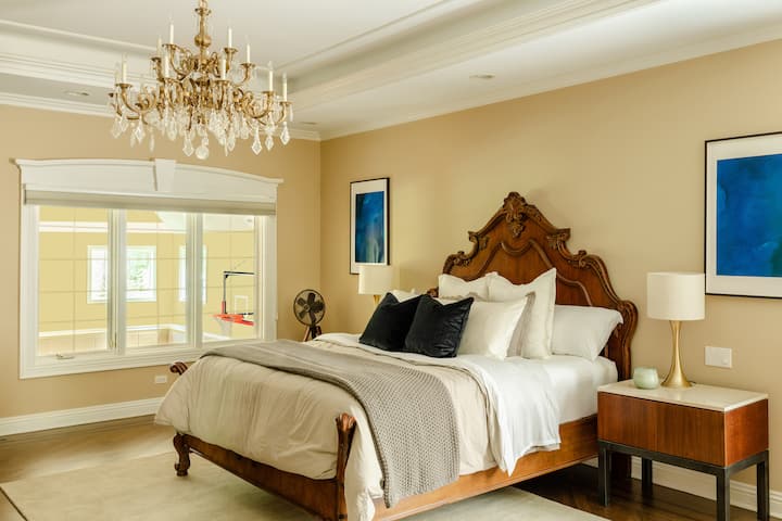 Sleep in the bedroom overlooking my indoor basketball court.