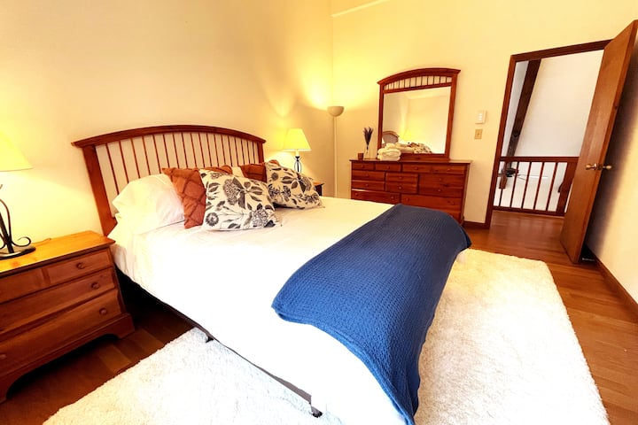 Bedroom two, with a ton of natural light for rest and relaxation. 