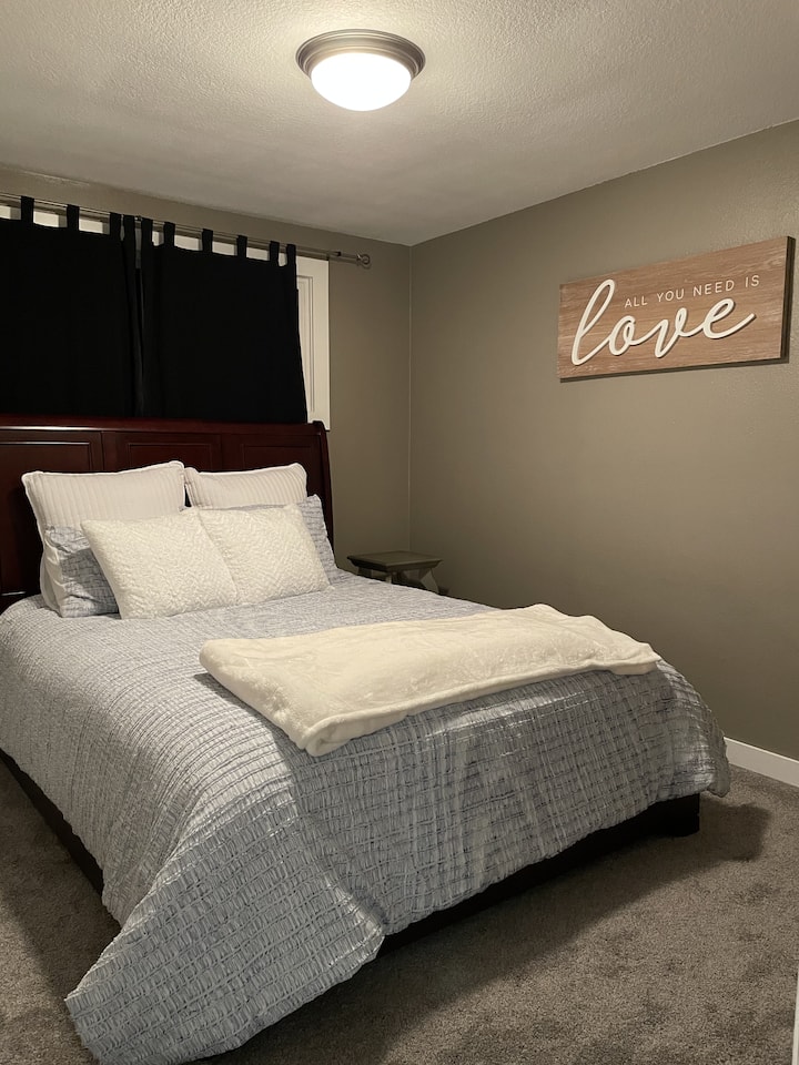 Relax with this queen sized bed or watch tv.