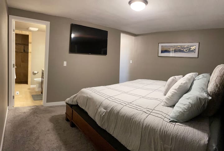Full bathroom off this master bedroom with flat screen tv.