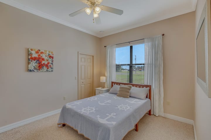 Guest bedroom #2 with queen bed, large closet and big window