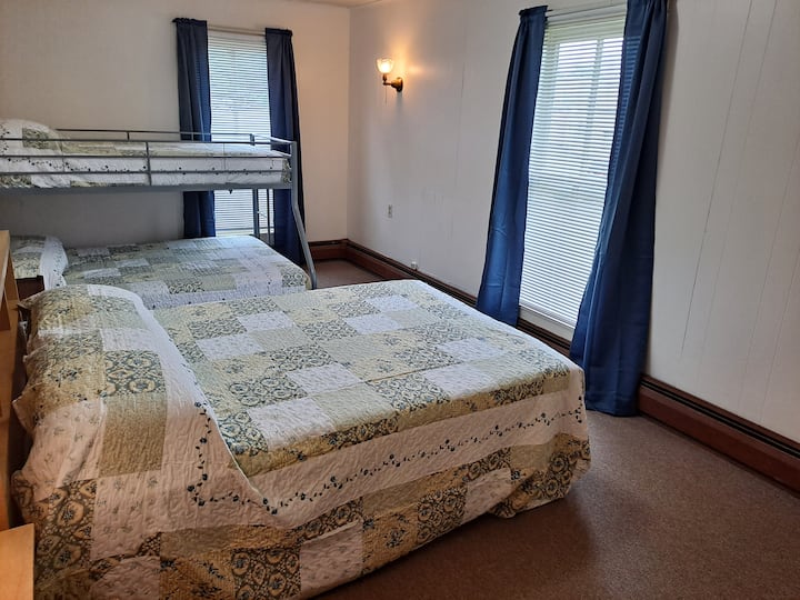 "Guest" bedroom has a Full bed as well as a Twin/Full bunk bed.  Also provided is a chest of drawers and spacious closet