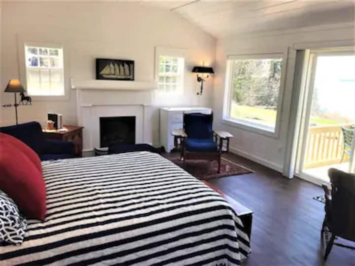 Oceanfront master bedroom with fireplace 