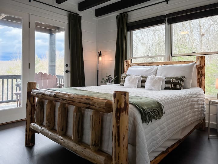 The queen balcony room on the main floor has direct access to the main floor deck.