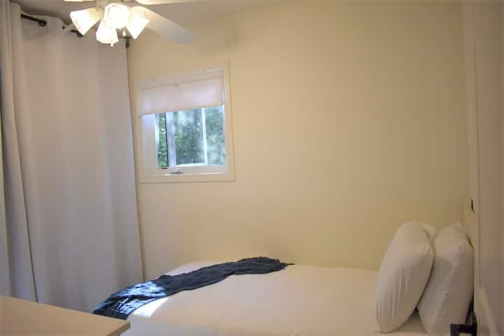 Bedroom # 2 - with a twin bed, complete with laundry.