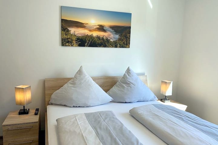 O quarto com foto do nascer do sol no Saarloop