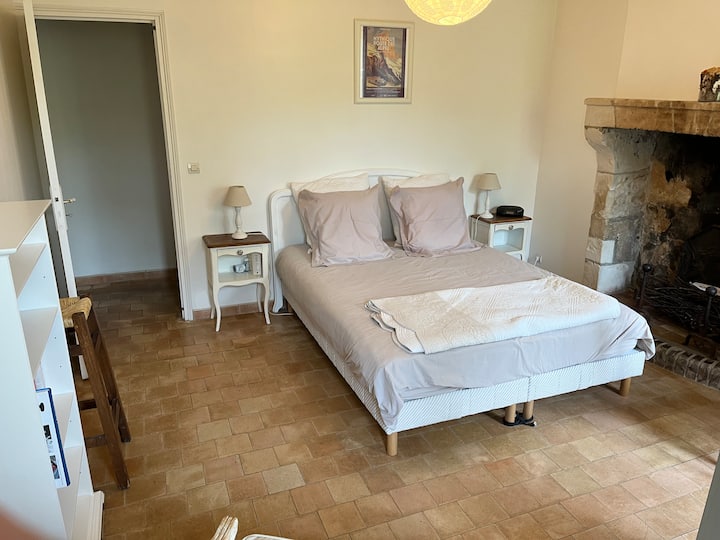 Bedroom 1. Large 160 x 200 double bed with pocket springs. Cheve tables and bedside lamps.  Storage wardrobe with wardrobe. Large decorative fireplace. Work desk with chair and desk lamp. Large armchair