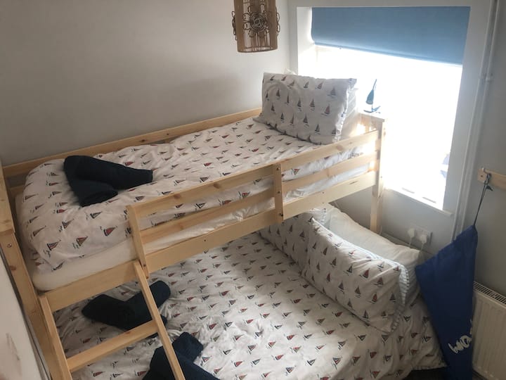 Bedroom 3
Triple bunk bed with double on the bottom and single on the top.