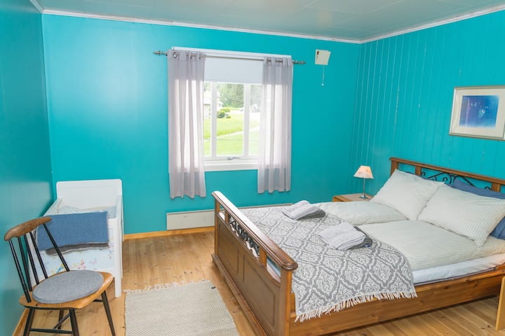 Bedroom 1. Double bed and baby bed.