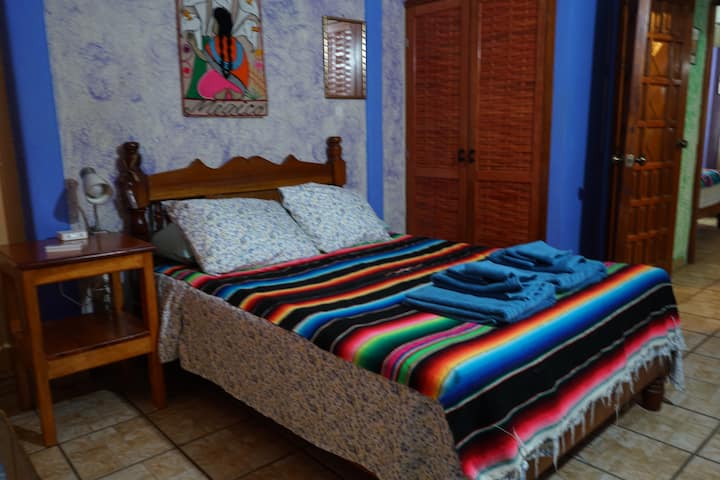 Main bedroom with double bed, a/c, closet and safe