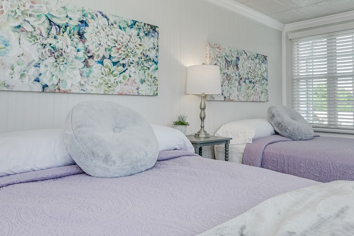 Experience the ultimate in comfort. Sink into our luxurious microfiber bedspreads and sheets for a restful night's sleep. Convenient charging stations and complimentary earplugs guarantee an undisturbed and peaceful rest.