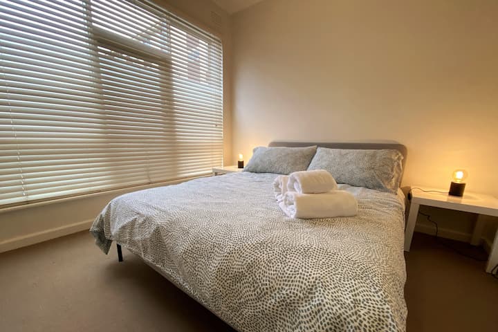 Rest on this comfy queen size bed with four pillows and a duvet. Reading lamps on both sides of the bed. There are extra pillows, linen and another duvet in the linen cupboard.