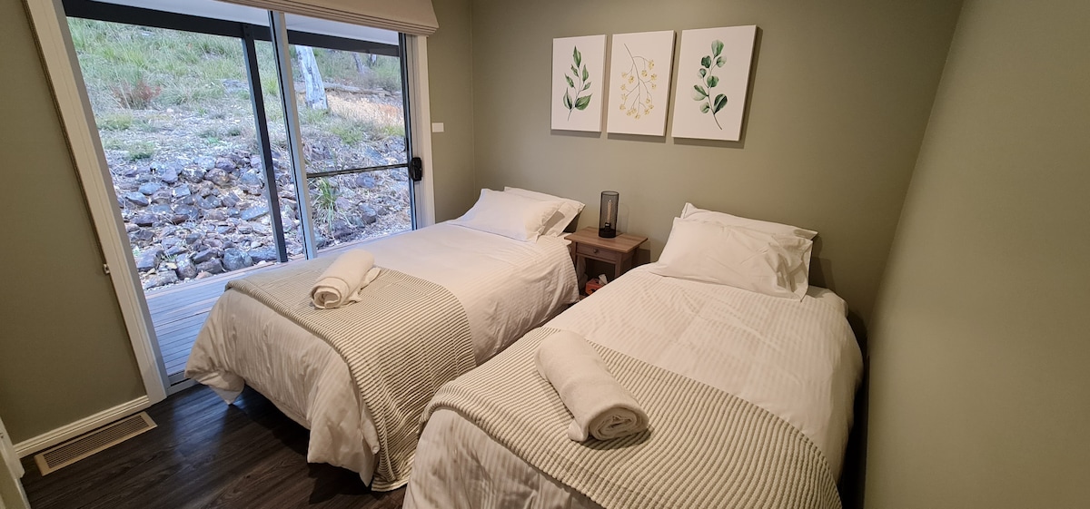 Third bedroom has two king single beds.