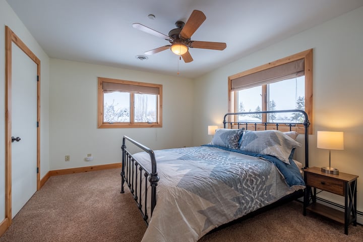 First floor bedroom with queen size bed and ensuite bathroom