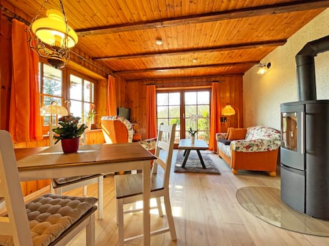 Blockhouse idyll with fireplace, terrace and garden
