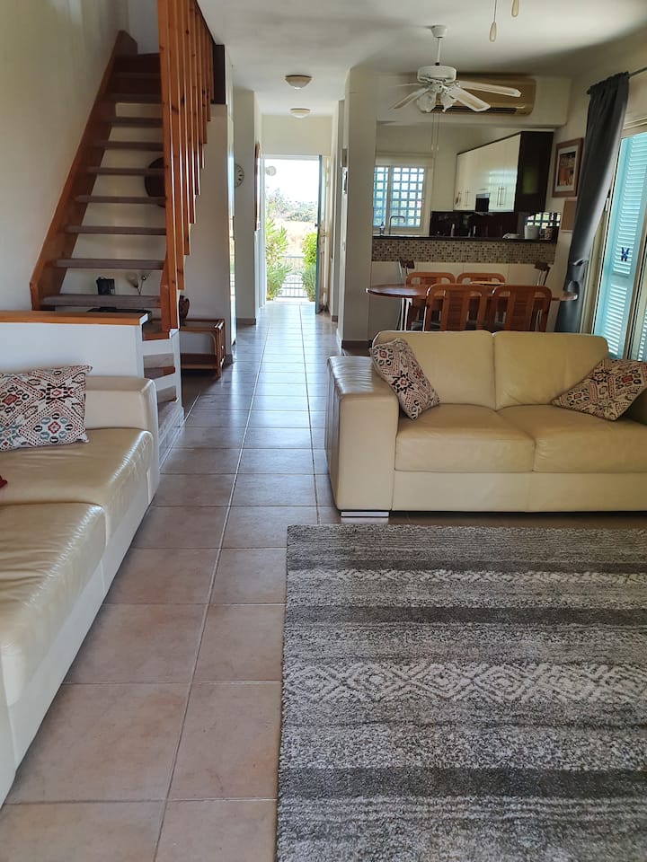 Open plan living room dining area and kitchen
