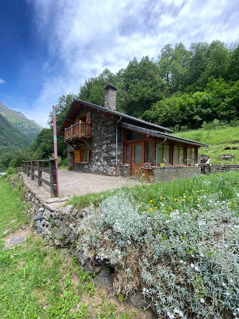 Beautiful stone house at the foot of the mountains