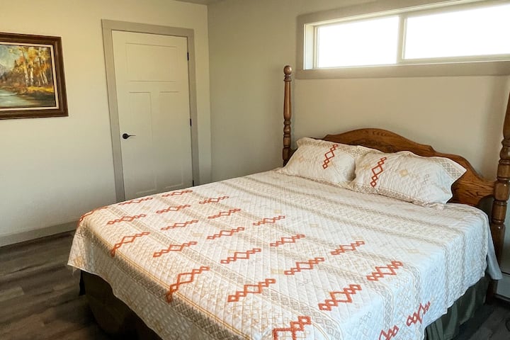 Master Bedroom with King bed and walk in closet with master bath.