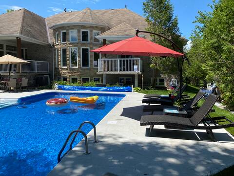 All Season Waterfront Retreat with Pool & Hot Tub