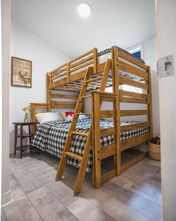 3rd bedroom with a bunk bed both levels suitable for kids and adults.  Bottom bunk: double bed; top bunk: single. Black out curtains.