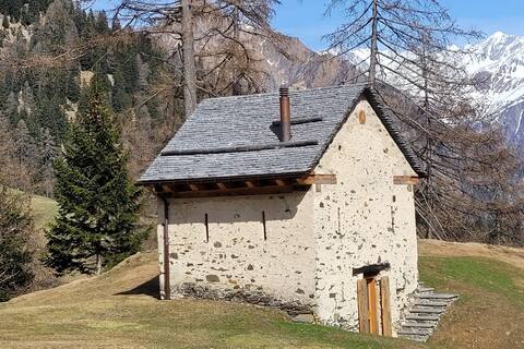 Runloda farmhouse In
the quiet between the larches