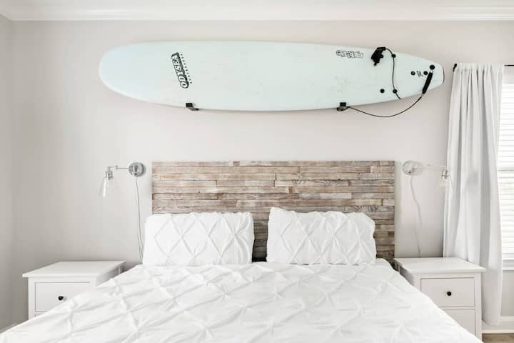 King sized bed in the primary bedroom.