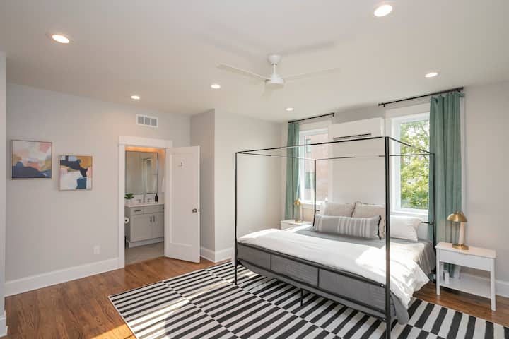Sink into our luxurious king sized bed with plush memory foam mattress, blackout curtains, and catch up on your favorite show! The master bedroom is the entire second floor of the townhome and also features an en suite full bathroom.