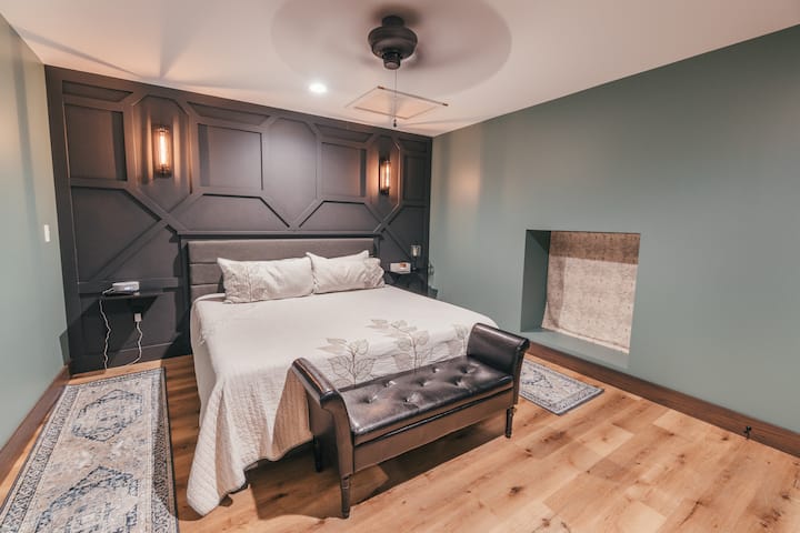 Bedroom includes a king size bed.