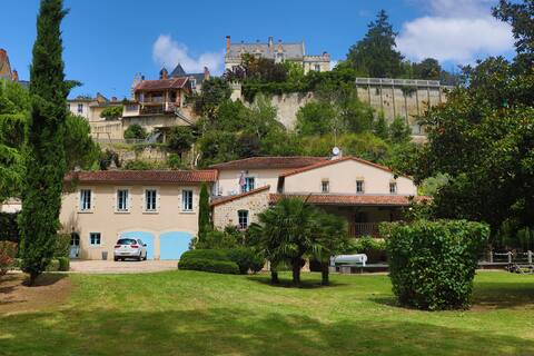 Riverside villa with pool in historic town