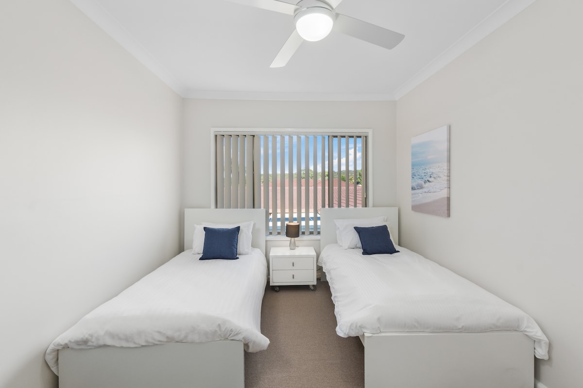 The fourth bedroom is fitted with two single beds, perfect for those travelling with the kids.