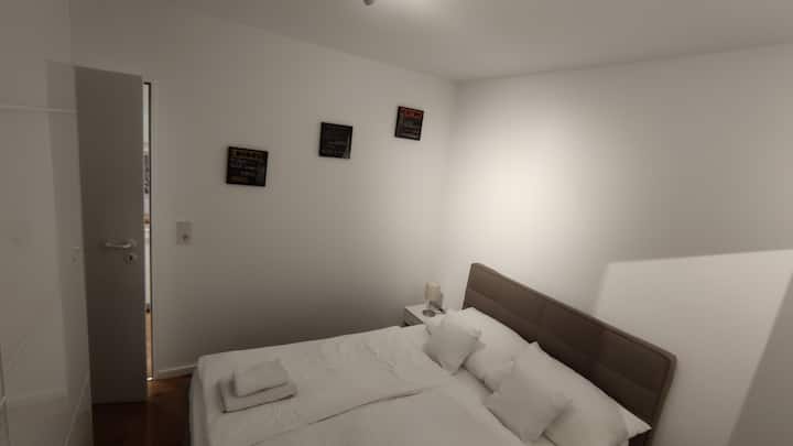 Sliding doors wardrobe in the bedroom (here you will also find an ironing board with iron, 3 folding chairs with upholstery pads, baby bed, high chair and storage space for clothes.