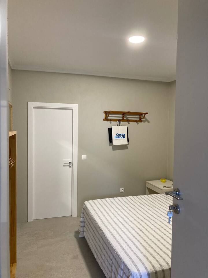 The bedroom. From the living room we approach the bedroom and bathroom.