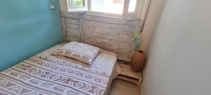 חדר השינה עם המיטה מ - A Piazza e Mezzo