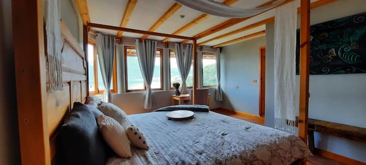 King-Size Four-Poster Bed in the Master Bedroom.