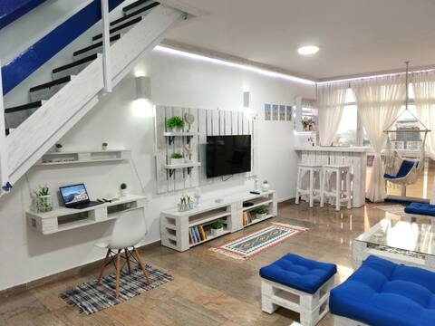 Beachy 2BR City Apartment with Mediterranean Feel.