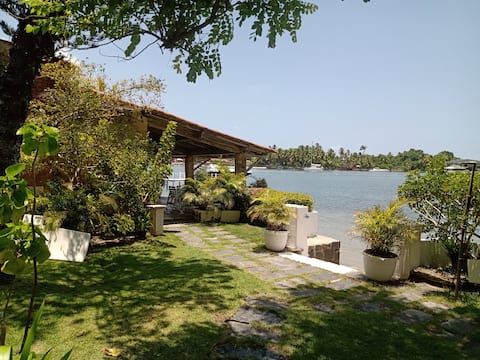 Beach house with private anchorage for boats