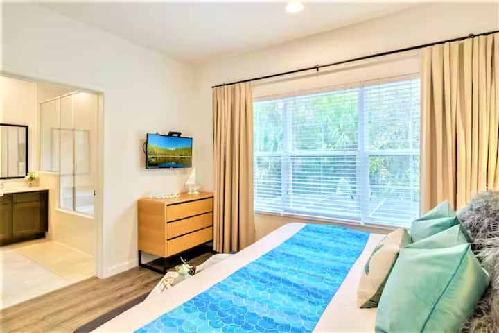 Beautiful and spacious master bedroom with King bed, en-suite bathroom and its own TV