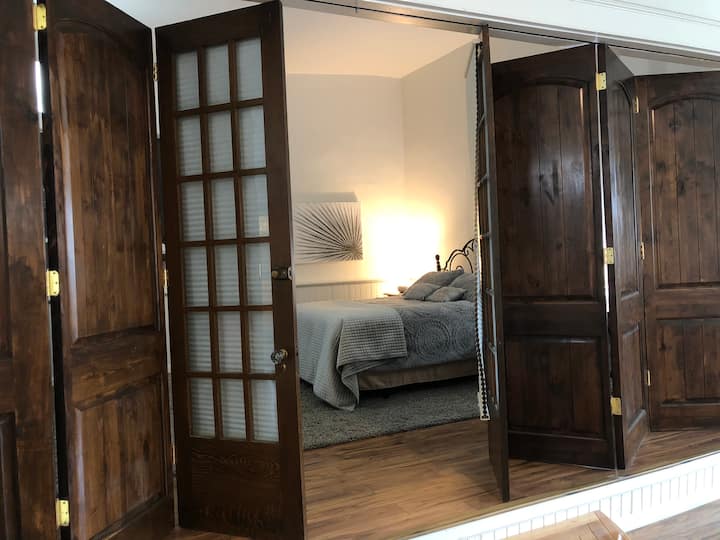 The Stage Room includes a queen bed.