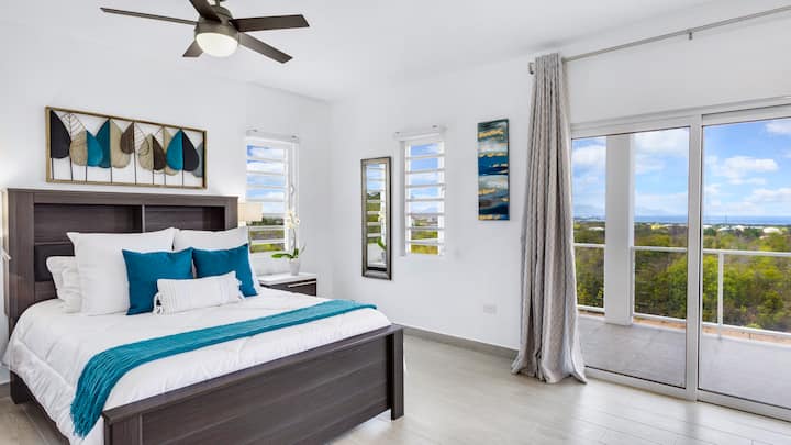 Enjoy beautiful ocean views from the comfort of your queen size bed.