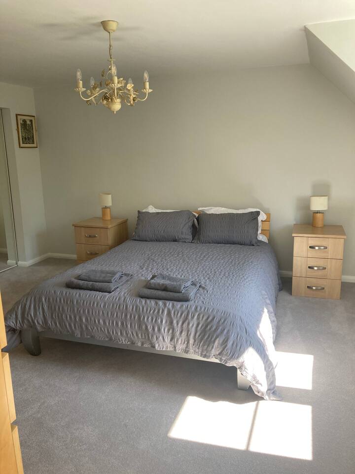 light and airy master bedroom with ensuite shower room, walk in wardrobe & nursery room