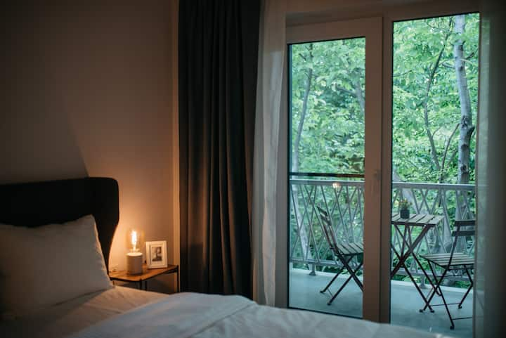 Studio with green and peaceful balcony