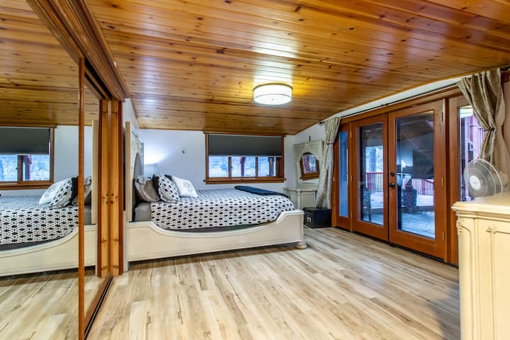 On the patio level you'll find the master bedroom with the feel of the "captains quarters" of the ship