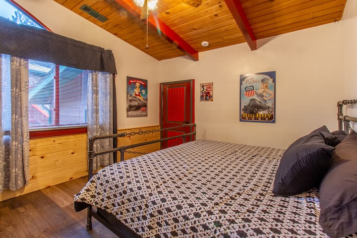 The fourth bedroom is adjacent to the media room and features high ceilings and a view