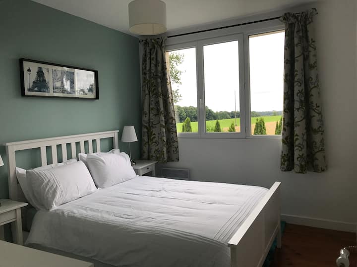 Your bedroom and its comfortable king size bed with beautiful views of the countryside and private garden.
