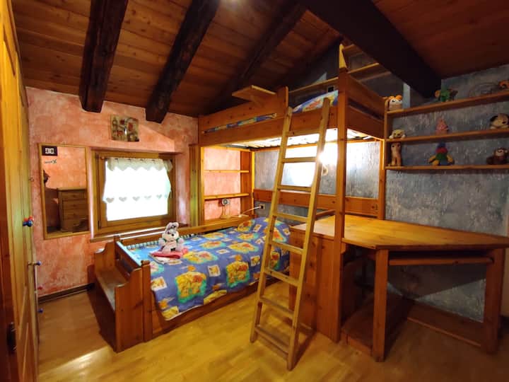 Second room with bunk bed and single bed. 3 beds