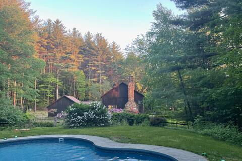 Lovely home with heated pool on secluded hillside.