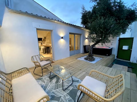 Charming house with a hot tub.