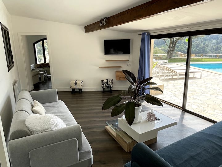 Second living room with flat screen wall mounted TV, games console & Apple TV.