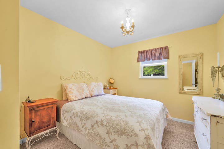 Bedroom with queen bed.