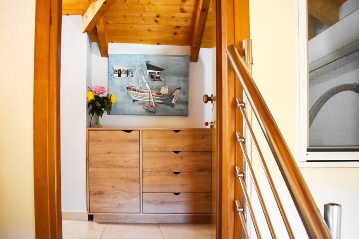 Loft entrance with chest of drawers